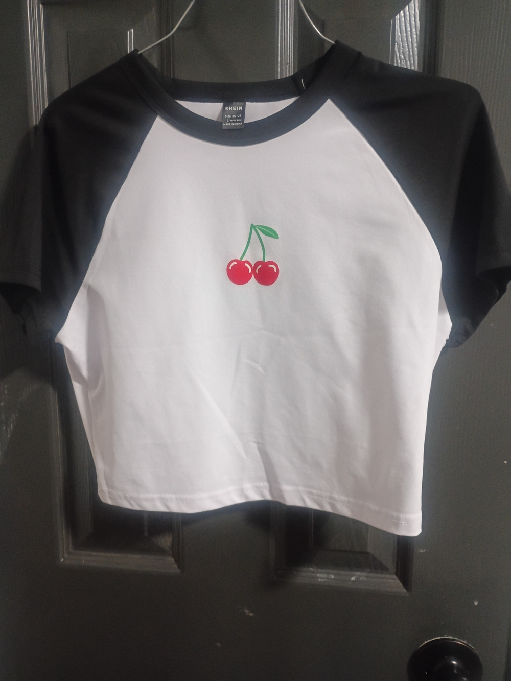 Women SHEIN White Crop Raglan Tee with Black Sleeves and Cherry Print Size #L
